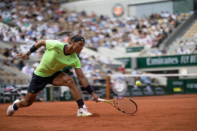 (210610) -- PARIS, June 10, 2021 -- Rafael Nadal of Spain hits a return during the men s singles quarterfinal against Diego Schwartzman of Argentina at the French Open tennis tournament at Roland Garros in Paris, France, June 9, 2021. (Photo by Aurelien Morissard Xinhua) (SP)FRANCE-PARIS-TENNIS-ROLAND GARROS-FRENCH OPEN-MEN S SINGLES-DAY 11 AoxLeilian¡¤molisaer 