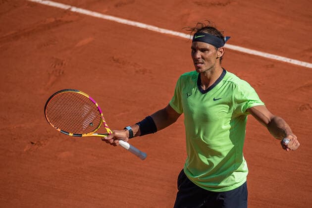 (210610) -- PARIS, June 10, 2021 -- Rafael Nadal of Spain celebrates his victory after winning the men s singles quarterfinal against Diego Schwartzman of Argentina at the French Open tennis tournament at Roland Garros in Paris, France, June 9, 2021. (Photo by Aurelien Morissard Xinhua) (SP)FRANCE-PARIS-TENNIS-ROLAND GARROS-FRENCH OPEN-MEN S SINGLES-DAY 11 AoxLeilian¡¤molisaer 