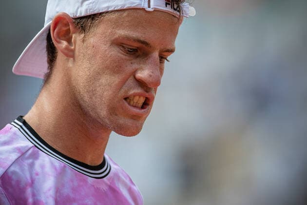 (210610) -- PARIS, June 10, 2021 -- Diego Schwartzman of Argentina reacts during the men s singles quarterfinal against Rafael Nadal of Spain at the French Open tennis tournament at Roland Garros in Paris, France, June 9, 2021. (Photo by Aurelien Morissard Xinhua) (SP)FRANCE-PARIS-TENNIS-ROLAND GARROS-FRENCH OPEN-MEN S SINGLES-DAY 11 AoxLeilian¡¤molisaer 