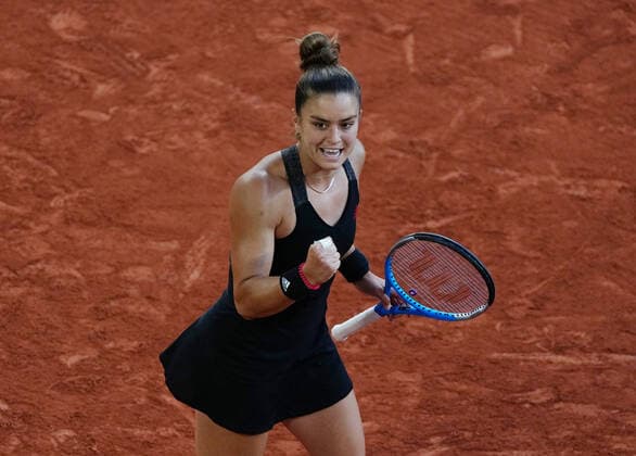 (210611) -- PARIS, June 11, 2021 -- Maria Sakkari of Greece celebrates during the women s singles semifinal match between Barbora Krejcikova of the Czech Republic and Maria Sakkari of Greece at the French Open tennis tournament at Roland Garros in Paris, France, June 10, 2021. ) (SP)FRANCE-PARIS-TENNIS-ROLAND GARROS-FRENCH OPEN-WOMEN S SINGLES-SEMIFINALS GaoxJing 