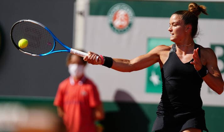 (210611) -- PARIS, June 11, 2021 -- Maria Sakkari of Greece hits a return during the women s singles semifinal match between Barbora Krejcikova of the Czech Republic and Maria Sakkari of Greece at the French Open tennis tournament at Roland Garros in Paris, France, June 10, 2021. ) (SP)FRANCE-PARIS-TENNIS-ROLAND GARROS-FRENCH OPEN-WOMEN S SINGLES-SEMIFINALS GaoxJing 