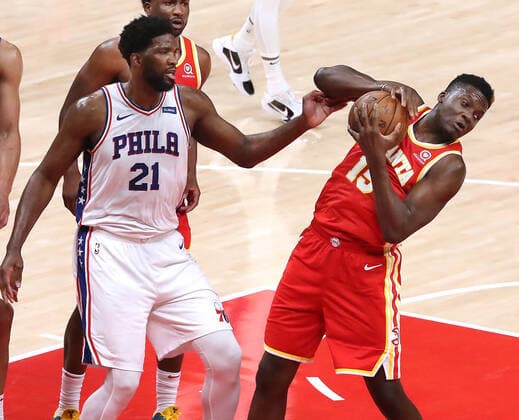 June 11, 2021, Atlanta, GA, USA: The Atlanta Hawks Clint Capela, right, grabs a defensive rebound away from the Philadelphia 76ers Joel Embiid (21) in Game 3 of their Eastern Conference semifinal at State Farm Arena on Friday, June 11, 2021, in Atlanta. The Sixers won, 127-111, for a 2-1 series lead. Atlanta USA - ZUMAm67_ 0121187661st Copyright: xCurtisxComptonx
