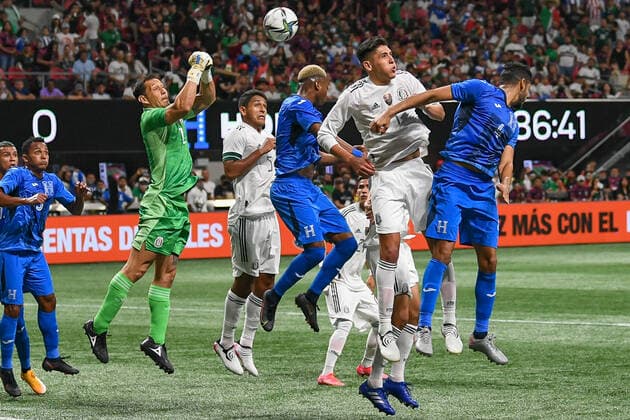 ATLANTA, GA Ã JUNE 12: Mexico goalkeeper Rodolfo Cota (12) punches out a corner kick during the International Friendly, LÃ¤nderspiel, Nationalmannschaft match between Honduras and Mexico on June 12th, 2021 at Mercedes-Benz Stadium in Atlanta, GA. (Photo by Rich von Biberstein Icon Sportswire) SOCCER: JUN 12 Mexico v Honduras Icon210612053