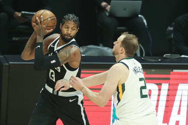 LOS ANGELES, CA - JUNE 12: LA Clippers guard Paul George (13) guarded by Utah Jazz guard Joe Ingles (2) during game 3 of the second round of the NBA, Basketball Herren, USA Western Conference playoffs between the Utah Jazz and the Los Angeles Clippers on June 12, 2021, at Staples Center in Los Angeles, CA. (Photo by Jevone Moore Icon Sportswire) NBA: JUN 12 Western Conference Playoffs Second Round - Jazz at Clippers Icon210612004