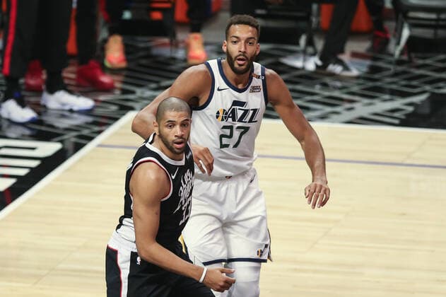 LOS ANGELES, CA - JUNE 12: Utah Jazz center Rudy Gobert (27) battling with LA Clippers forward Nicolas Batum (33) during game 3 of the second round of the NBA, Basketball Herren, USA Western Conference playoffs between the Utah Jazz and the Los Angeles Clippers on June 12, 2021, at Staples Center in Los Angeles, CA. (Photo by Jevone Moore Icon Sportswire) NBA: JUN 12 Western Conference Playoffs Second Round - Jazz at Clippers Icon210612026