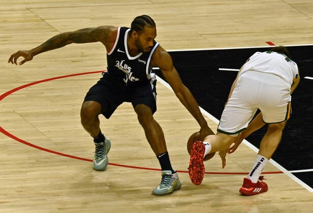 Los Angeles Clippers forward Kawhi Leonard (2) steals the ball from Utah Jazz forward Joe Ingles (2) during the first half of Game 3 of the Western Conference second-round playoffs at Staples Center in Los Angeles on Saturday, June 12, 2021. The Clippers rallied to win another game 3, a 132-106 win over the Utah Jazz that cuts their deficit in this second-round series to 2-1 entering Monday s fourth game.  LAP2021061222 JIMxRUYMEN