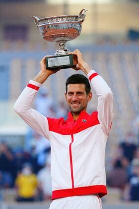 Mandatory Credit: Photo by Javier Garcia BPI Shutterstock (12058233lr) Novak Djokovic celebrates with the Musketeers Trophy after winning the Men s Singles final French Open Tennis, Day Fifteen, Roland Garros, Paris, France - 13 Jun 2021 French Open Tennis, Day Fifteen, Roland Garros, Paris, France - 13 Jun 2021  Copyright: xJavierxGarcia BPI Shutterstockx 12058233lr