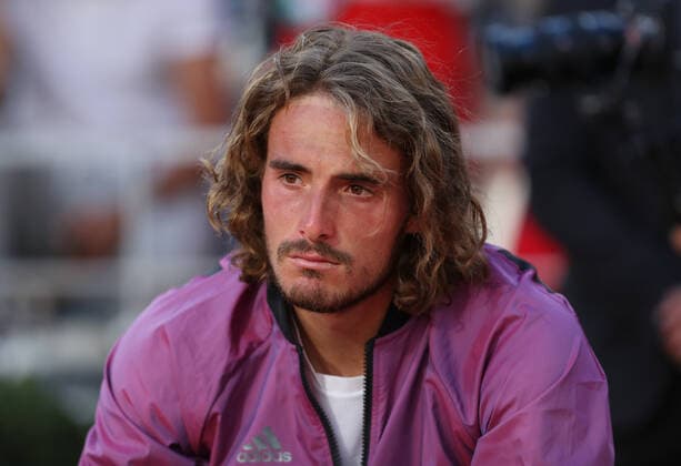(210614) -- PARIS, June 14, 2021 -- Stefanos Tsitsipas of Greece reacts during the awarding ceremony after the Men s Singles finals match against Novak Djokovic of Serbia at the French Open tennis tournament at Roland Garros in Paris, France, June 13, 2021. ) (SP)FRANCE-PARIS-TENNIS-ROLAND GARROS-FRENCH OPEN-MEN S SINGLES-FINALS GaoxJing 