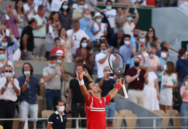 (210614) -- PARIS, June 14, 2021 -- Novak Djokovic of Serbia celebrates his victory after winning the Men s Singles finals match against Stefanos Tsitsipas of Greece at the French Open tennis tournament at Roland Garros in Paris, France, June 13, 2021. ) (SP)FRANCE-PARIS-TENNIS-ROLAND GARROS-FRENCH OPEN-MEN S SINGLES-FINALS GaoxJing 