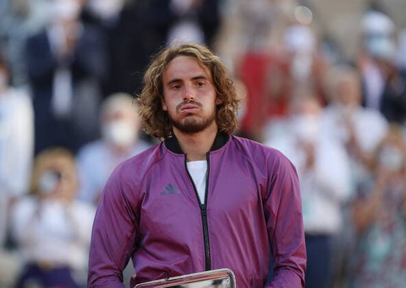(210614) -- PARIS, June 14, 2021 -- Stefanos Tsitsipas of Greece reacts during the awarding ceremony after the Men s Singles finals match against Novak Djokovic of Serbia at the French Open tennis tournament at Roland Garros in Paris, France, June 13, 2021. ) (SP)FRANCE-PARIS-TENNIS-ROLAND GARROS-FRENCH OPEN-MEN S SINGLES-FINALS GaoxJing 