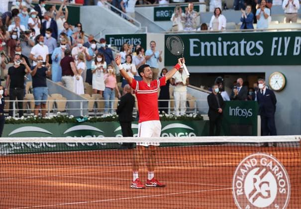 (210614) -- PARIS, June 14, 2021 -- Novak Djokovic of Serbia celebrates his victory after winning the Men s Singles finals match against Stefanos Tsitsipas of Greece at the French Open tennis tournament at Roland Garros in Paris, France, June 13, 2021. ) (SP)FRANCE-PARIS-TENNIS-ROLAND GARROS-FRENCH OPEN-MEN S SINGLES-FINALS GaoxJing 