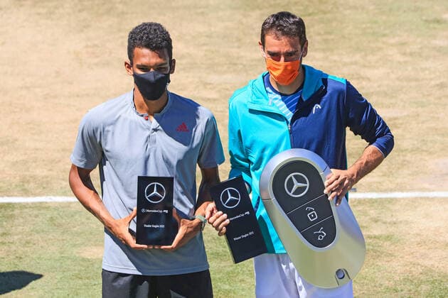 (210614) -- STUTTGART, June 14, 2021 -- Marin Cilic (R) of Croatia poses for photos with Felix Auger-Aliassime of Canada during the awarding ceremony after the men s singles final match of Mercedes Cup in Stuttgart, Germany, June 13, 2021. Marin Cilic won 2-0 and claimed the title. (Photo by Xinhua) (SP)GERMANY-STUTTGART-TENNIS-MERCEDES CUP-MEN S SINGLES-FINAL PhilippexRuiz 