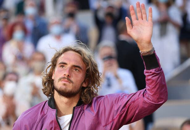 (210614) -- PARIS, June 14, 2021 -- Stefanos Tsitsipas of Greece reacts during the awarding ceremony after the Men s Singles finals match against Novak Djokovic of Serbia at the French Open tennis tournament at Roland Garros in Paris, France, June 13, 2021. ) (SP)FRANCE-PARIS-TENNIS-ROLAND GARROS-FRENCH OPEN-MEN S SINGLES-FINALS GaoxJing 