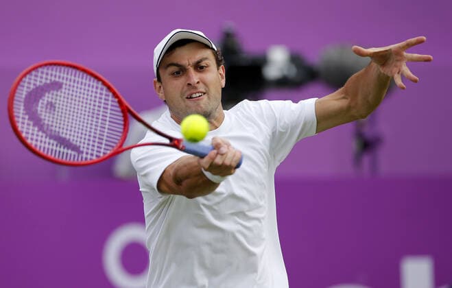 Mandatory Credit: Photo by Ella Ling BPI Shutterstock (12071591cp) Aslan Karatsev of Russia in action Cinch Championships, Day One, Tennis, Queens Club, London, UK - 14 June 2021 EDITORIAL USE ONLY No use with unauthorised audio, video, data, fixture lists, club league logos or live services. Online in-match use limited to 120 images, no video emulation. No use in betting, games or single club league player publications. Cinch Championships, Day One, Tennis, Queens Club, London, UK - 14 June 2021 EDITORIAL USE ONLY No use with unauthorised audio, video, data, fixture lists, club league logos or live services. Online in-match use limited to 120 images, no video emulation. No use in betting, games or single club league player publications.  Copyright: xEllaxLing BPI Shutterstockx 12071591cp