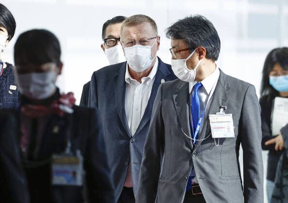 IOC Vice President Coates in Tokyo International Olympic Committee Vice President John Coates (C) arrives at Tokyo s Haneda airport on June 15, 2021, to oversee final preparations for the Tokyo Olympics starting late next month following its one-year postponement due to the coronavirus pandemic. 