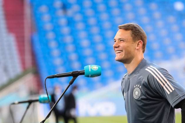 (210615) -- MUNICH, June 15, 2021 -- Goalkeeper Manuel Neuer of Germany receives an interview prior to a training session in Munich, Germany, June 14, 2021. Germany is to play against France in a UEFA EURO, EM, Europameisterschaft,Fussball 2020 Championship Group F match in Germany s Munich on June 15. ) (SP)GERMANY-MUNICH-FOOTBALL-EURO 2020-GERMANY-TRAINING SESSION ShanxYuqi 