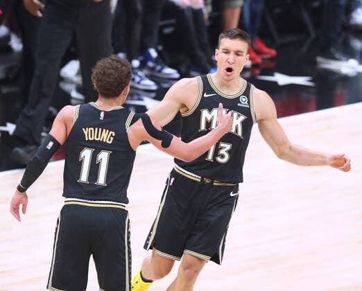 June 14, 2021, Atlanta, GA, USA: Atlanta Hawks guard Bogan Bogdanovic gets five from Trae Young after hitting a three-pointer against the Philadelphia 76ers in game 4 of their NBA, Basketball Herren, USA Eastern Conference semifinals series on Monday, June 14, 2021, in Atlanta. Atlanta USA - ZUMAm67_ 0121512621st Copyright: xCurtisxComptonx