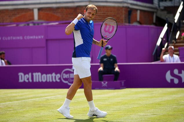 Mandatory Credit: Photo by Ella Ling BPI Shutterstock (12074706bt) Dan Evans of GBR celebrates Cinch Championships, Day Two, Tennis, Queens Club, London, UK - 15 June 2021 EDITORIAL USE ONLY No use with unauthorised audio, video, data, fixture lists, club league logos or live services. Online in-match use limited to 120 images, no video emulation. No use in betting, games or single club league player publications. Cinch Championships, Day Two, Tennis, Queens Club, London, UK - 15 June 2021 EDITORIAL USE ONLY No use with unauthorised audio, video, data, fixture lists, club league logos or live services. Online in-match use limited to 120 images, no video emulation. No use in betting, games or single club league player publications.  Copyright: xEllaxLing BPI Shutterstockx 12074706bt