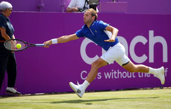 Mandatory Credit: Photo by Ella Ling BPI Shutterstock (12074706bq) Dan Evans of GBR in action Cinch Championships, Day Two, Tennis, Queens Club, London, UK - 15 June 2021 EDITORIAL USE ONLY No use with unauthorised audio, video, data, fixture lists, club league logos or live services. Online in-match use limited to 120 images, no video emulation. No use in betting, games or single club league player publications. Cinch Championships, Day Two, Tennis, Queens Club, London, UK - 15 June 2021 EDITORIAL USE ONLY No use with unauthorised audio, video, data, fixture lists, club league logos or live services. Online in-match use limited to 120 images, no video emulation. No use in betting, games or single club league player publications.  Copyright: xEllaxLing BPI Shutterstockx 12074706bq