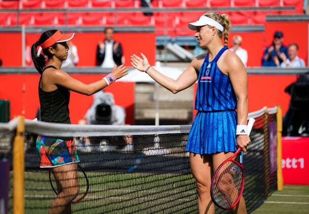Mandatory Credit: Photo by Rob Prange Shutterstock (12072931cg) Misaki Doi of Japan & Angelique Kerber of Germany at the net after their first-round match at the 2021 bett1open WTA, Tennis Damen 500 tennis tournament bett1open Tournament, Tennis, Berlin, Germany - 15 Jun 2021 bett1open Tournament, Tennis, Berlin, Germany - 15 Jun 2021  Copyright: xRobxPrange Shutterstockx 12072931cg