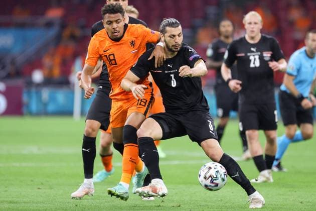 SOCCER - UEFA EURO, EM, Europameisterschaft,Fussball 2020, NED vs AUT AMSTERDAM,NETHERLANDS,17.JUN.21 - SOCCER - UEFA European Championship, EM, Europameisterschaft OEFB international match, Länderspiel, Nationalmannschaft Netherlands vs Austria. Image shows Donyell Malen (NED) and Aleksandar Dragovic (AUT). GEPAxpictures xChristianxWalgram