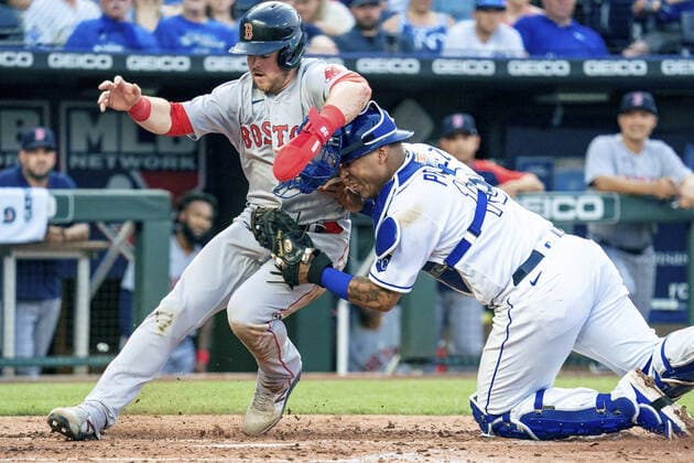 Sport Bilder des Tages Boston Red Sox third baseman Christian Arroyo (39) is tagged out as he collides with Kansas City Royals catcher Salvador Perez (13) in the third inning at Kaufman Stadium in Kansas City, Missouri on Friday, June 18, 2021.  KCP20210618114 KYLExRIVAS