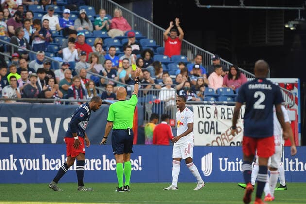 June 23, 2021: New York Red Bulls defender Kyle Duncan (6) receives a yellow card warning from referee Robert Sibiga during the MLS, Fussball Herren, USA game between New York Red Bulls and the New England Revolution held at Gillette Stadium in Foxborough Massachusetts. New England defeats New York 3-2. CSM Foxborough USA - ZUMAc04_ 20210623_zaf_c04_045 Copyright: xEricxCanhax