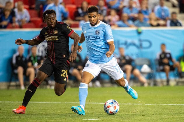 June 23, 2021, Harrison, NJ, US: New York City FC midfielder ISMAEL TAJOURI-SHRADI 17 shoots to score the only goal of the game defended by Atlanta United defender GEORGE BELLO 21 during a regular season game at Red Bull Arena in Harrison, NJ. New York City FC defeats Atlanta United 1-0 Harrison US - ZUMAs192 20210623_zap_s192_027 Copyright: xMarkxSmithx