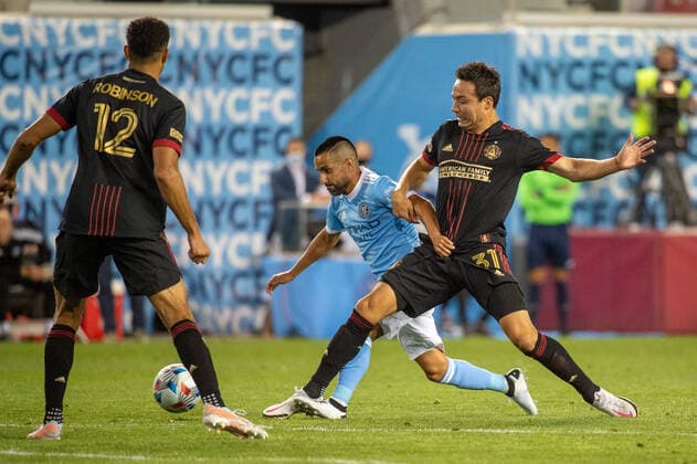 June 23, 2021, Harrison, NJ, US: New York City FC midfielder MAXIMILIANO MORALEZ 10 runs with the ball defended by Atlanta United forward ERICK TORRES 31 and Atlanta United defender MILES ROBINSON 12 during a regular season game at Red Bull Arena in Harrison, NJ. New York City FC defeats Atlanta United 1-0 Harrison US - ZUMAs192 20210623_zap_s192_028 Copyright: xMarkxSmithx
