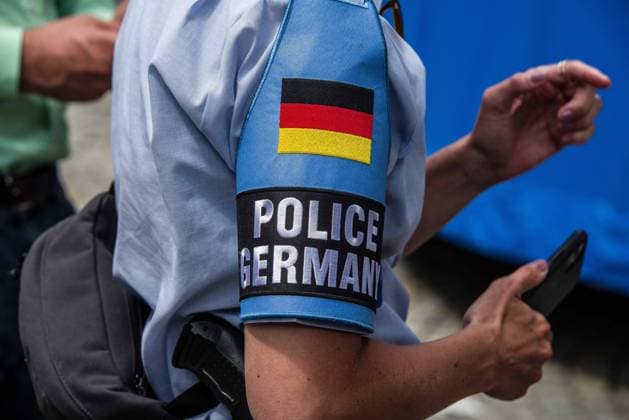 June 23, 2021, Munich, Bavaria, Germany: A liaison of the police in Germany at a football fan event. The ultra-nationalist, neonazi hooligan group Carpathian Brigade Ã‚ mobilized in Munich on the day of the European Championships of Football when the Allianz Stadium was to be lit with the colors of the rainbow.Ã‚ Security experts see this often black-clad problematic mob as a paramilitary group who would like to restore the borders of Greater Hungary rather than aa simple hooligans.. The Munich police stated that approximately 2000 were expected with 200 being seen as particularly dangerous,, according to their exhanges with security services. The group has already disrupted matches in the past and displayed Hitler Salutes and chanted racist slogans. Munich Germany - ZUMAb160 0122613130st Copyright: xSachellexBabbarx