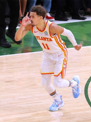 June 23, 2021, Milwaukee, WI, USA: The Atlanta Hawks Trae Young reacts to hitting a 3-pointer against the Milwaukee Bucks in Game 1 of the NBA, Basketball Herren, USA Eastern Conference Finals on Wednesday, June 23, 2021, at the Fiserv Forum in Milwaukee. The Hawks won, 116-113. Milwaukee USA - ZUMAm67_ 0122638643st Copyright: xCurtisxComptonx