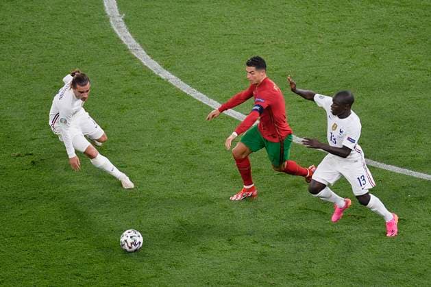 Portugal v France - UEFA EURO, EM, Europameisterschaft,Fussball 2020: Group F Cristiano Ronaldo of Portugal battles for possession with N Golo Kante and Anoine Griezmann of France during the UEFA European Championship, EM, Europameisterschaft 2020 football match between Portugal and France at Stadium Puskas Ferenc on June 23, 2021 in Budapest, Hungary. Budapest Hungary nicodim-notitle210623_npZfI  Copyright: xAlexxNicodimx