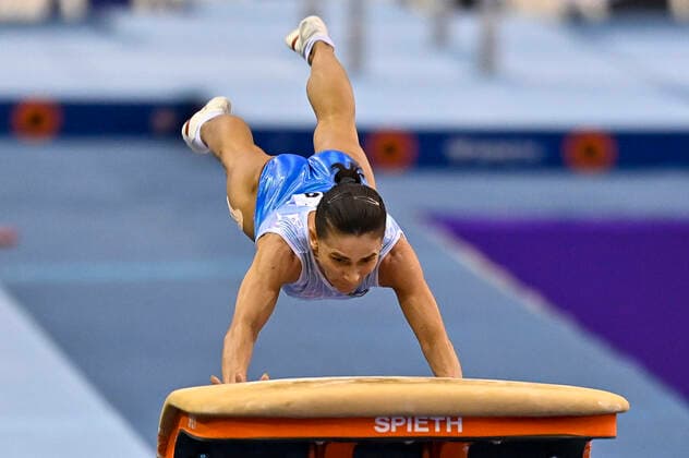 (210626) -- DOHA, June 26, 2021 -- Oksana Chusovitina of Uzbekistan competes during the Women s Vault Final at the 13th FIG Artistic Gymnastics World Cup in Doha, capital of Qatar, on June 25, 2021. (Photo by Xinhua) (SP)QATAR-DOHA-GYMNASTICS-WORLD CUP Nikku 