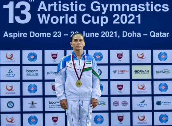 (210626) -- DOHA, June 26, 2021 -- Gold medalist Oksana Chusovitina of Uzbekistan looks on during the awarding ceremony for the Women s Vault Final at the 13th FIG Artistic Gymnastics World Cup in Doha, capital of Qatar, on June 25, 2021. (Photo by Xinhua) (SP)QATAR-DOHA-GYMNASTICS-WORLD CUP Nikku 