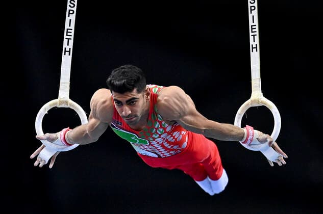 (210626) -- DOHA, June 26, 2021 -- Mahdi Ahmad Kohani of Iran competes during the Men s Rings Final at the 13th FIG Artistic Gymnastics World Cup in Doha, capital of Qatar, on June 25, 2021. (Photo by Nikku Xinhua) (SP)QATAR-DOHA-GYMNASTICS-WORLD CUP yangyuanyong 