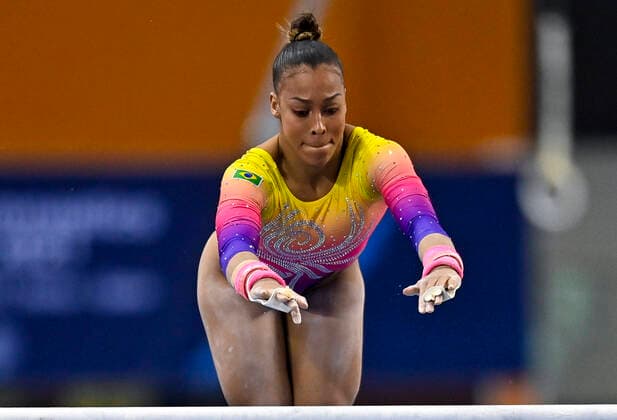 (210626) -- DOHA, June 26, 2021 -- Lorrane Oliveira of Brazil competes during the Women s Uneven Bars Final at the 13th FIG Artistic Gymnastics World Cup in Doha, capital of Qatar, on June 25, 2021. (Photo by Xinhua) (SP)QATAR-DOHA-GYMNASTICS-WORLD CUP Nikku 