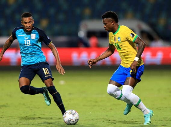 GOIANIA, BRAZIL - JUNE 27: Jose Vinicius Jr of Brazil competes for the ball with Ayrton Preciado of Ecuador ,during the match between Brazil and Ecuador as part of Conmebol Copa America Brazil 2021 at Estadio Olimpico on June 27, 2021 in Goiania, Brazil. SPO, SOC 