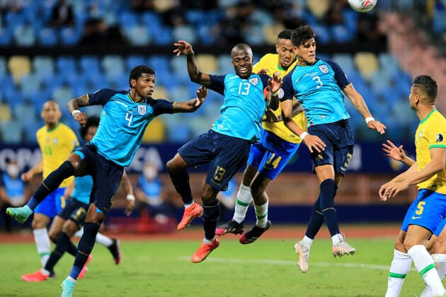 GOIANIA, BRAZIL - JUNE 27: Eder Militao of Brazil head the ball against Piero Hincapie ,Enner Valencia and Robert Arboleda of Ecuador ,during the match between Brazil and Ecuador as part of Conmebol Copa America Brazil 2021 at Estadio Olimpico on June 27, 2021 in Goiania, Brazil. SPO, SOC 
