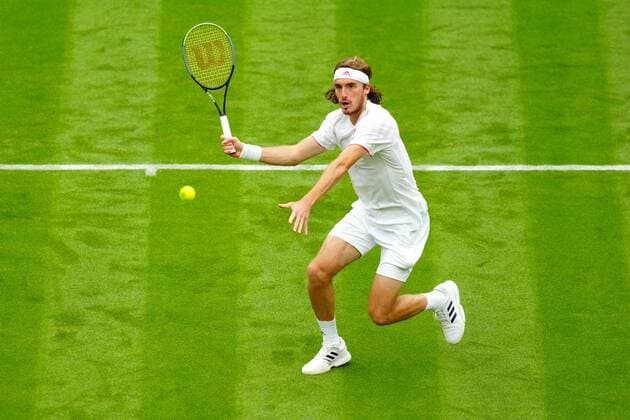 Mandatory Credit: Photo by Javier Garcia BPI Shutterstock (12172248ia) Stefanos Tsitsipas nets an easy volley during his first round match Wimbledon Tennis Championships, Day 1, The All England Lawn Tennis and Croquet Club, London, UK - 28 Jun 2021 Wimbledon Tennis Championships, Day 1, The All England Lawn Tennis and Croquet Club, London, UK - 28 Jun 2021  Copyright: xJavierxGarcia BPI Shutterstockx 12172248ia