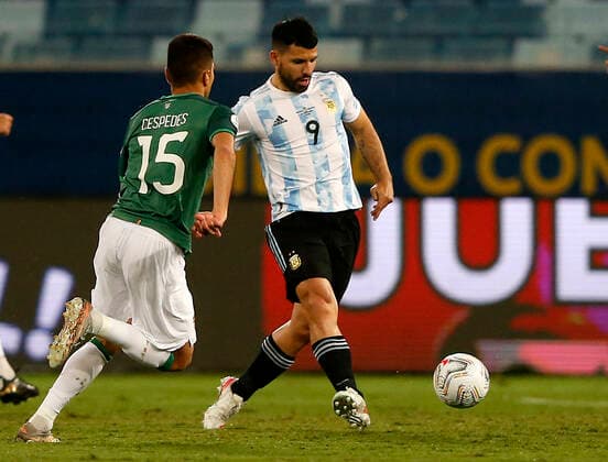 CUIABA, BRAZIL - JUNE 28: Sergio Aguero of Argentina competes for the ball with Boris Cespedes of Bolivia ,during the match between Bolivia and Argentina as part of Conmebol Copa America Brazil 2021 at Estadio Arena Pantanal on June 28, 2021 in Cuiaba, Brazil. SPO, SOC, ICH 