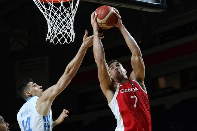 June 29, 2021, Victoria, BC, Canada: Canada s Dwight Powell drives to the hoop as Greece s Konstantinos Mitoglou tries to defend during first half FIBA Men s Olympic Qualifying basketball action at Memorial Arena in Victoria, Tuesday, June 29, 2021. Dwight Powell,Konstantinos Mitoglou,  - ZUMAc35_ 20210629_zaf_c35_023 Copyright: xChadxHipolitox