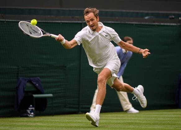 Mandatory Credit: Photo by AELTC Shutterstock (12189895ay) Daniil Medvedev (RUS) in action against Jan-Lennard Struff (GER) in the first round of the Gentlemen s Singles on No.1 Court at The Championships 2021 Wimbledon Tennis Championships, Day 2, The All England Lawn Tennis and Croquet Club, London, UK - 29 Jun 2021 Editorial Use Only Wimbledon Tennis Championships, Day 2, The All England Lawn Tennis and Croquet Club, London, UK - 29 Jun 2021 Editorial Use Only  Copyright: xAELTC Shutterstockx 12189895ay
