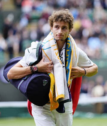 Mandatory Credit: Photo by Shutterstock (12190134s) Ugo Humbert after defeat in his first round match Wimbledon Tennis Championships, Day 3, The All England Lawn Tennis and Croquet Club, London, UK - 30 Jun 2021 Wimbledon Tennis Championships, Day 3, The All England Lawn Tennis and Croquet Club, London, UK - 30 Jun 2021  Copyright: xShutterstockx 12190134s