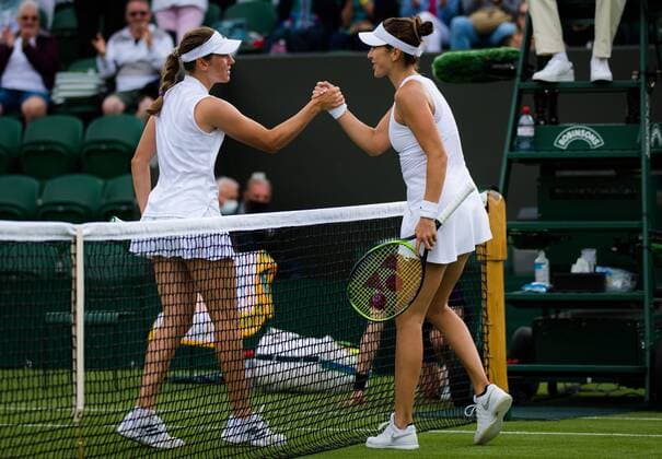 Mandatory Credit: Photo by Rob Prange Shutterstock (12189892fd) Kaja Juvan of Slovenia & Belinda Bencic of Switzerland at the net after the first round of the 2021 Wimbledon Championships Grand Slam tennis tournament Wimbledon Tennis Championships, Day 3, The All England Lawn Tennis and Croquet Club, London, UK - 30 Jun 2021 Wimbledon Tennis Championships, Day 3, The All England Lawn Tennis and Croquet Club, London, UK - 30 Jun 2021  Copyright: xRobxPrange Shutterstockx 12189892fd