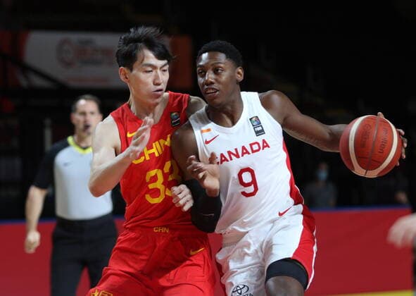 June 30, 2021, Victoria, BC, Canada: Canada s RJ Barrett protects the ball from China s Qian Wu during the first half of FIBA Men s Olympic Qualifying basketball action at Memorial Arena in Victoria, B.C., on Wednesday, June 30, 2021. RJ Barrett, Qian Wu, - ZUMAc35_ 20210630_zaf_c35_062 Copyright: xChadxHipolitox