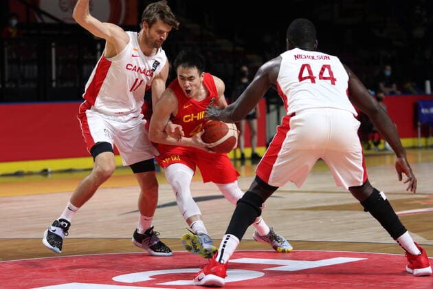 June 30, 2021, Victoria, BC, Canada: Canada s Aaron Doornekamp, left, and Andrew Nicholson defend against China s Jiwei Zhao during the second half of FIBA Men s Olympic Qualifying basketball action at Memorial Arena in Victoria, B.C., on Wednesday, June 30, 2021. Aaron Doornekamp,Andrew Nicholson,Jiwei Zhao - ZUMAc35_ 20210630_zaf_c35_063 Copyright: xChadxHipolitox