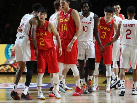 June 30, 2021, Victoria, BC, Canada: China s Jie Xu, second left, congratulates Canada s Nickeil Alexander-Walker and teammates at the end of the second half of FIBA Men s Olympic Qualifying basketball action at Memorial Arena in Victoria, B.C., on Wednesday, June 30, 2021. Jie Xu,Nickeil Alexander-Walker - ZUMAc35_ 20210630_zaf_c35_072 Copyright: xChadxHipolitox