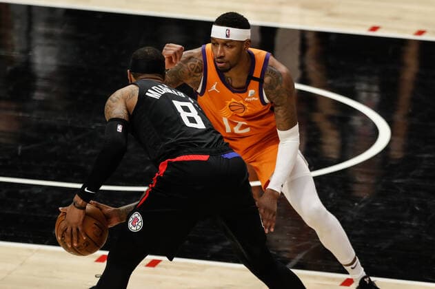 LOS ANGELES, CA - JUNE 30:LA Clippers forward Marcus Morris Sr. (8) guarded by Phoenix Suns forward Torrey Craig (12) during game 6 of the NBA, Basketball Herren, USA Western Conference Final between the Phoenix Suns and the Los Angeles Clippers on June 30, 2021, at Staples Center in Los Angeles, CA. (Photo by Jevone Moore Icon Sportswire) NBA: JUN 30 Western Conference Final - Suns at Clippers Icon210630076