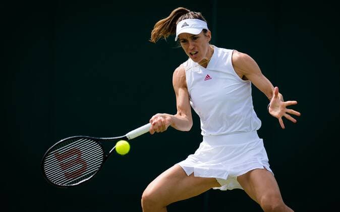 Mandatory Credit: Photo by Rob Prange Shutterstock (12191441g) Andrea Petkovic of Germany in action during the second round of the 2021 Wimbledon Championships Grand Slam tennis tournament Wimbledon Tennis Championships, Day 4, The All England Lawn Tennis and Croquet Club, London, UK - 01 Jul 2021 Wimbledon Tennis Championships, Day 4, The All England Lawn Tennis and Croquet Club, London, UK - 01 Jul 2021  Copyright: xRobxPrange Shutterstockx 12191441g