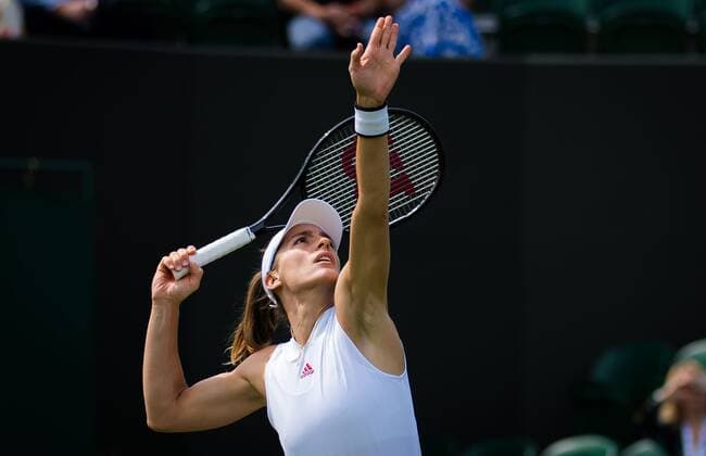 Mandatory Credit: Photo by Rob Prange Shutterstock (12191441j) Andrea Petkovic of Germany in action during the second round of the 2021 Wimbledon Championships Grand Slam tennis tournament Wimbledon Tennis Championships, Day 4, The All England Lawn Tennis and Croquet Club, London, UK - 01 Jul 2021 Wimbledon Tennis Championships, Day 4, The All England Lawn Tennis and Croquet Club, London, UK - 01 Jul 2021  Copyright: xRobxPrange Shutterstockx 12191441j